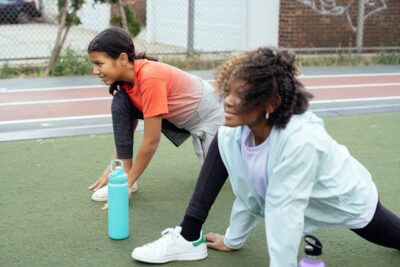 Two girls exercising fitness and cardio