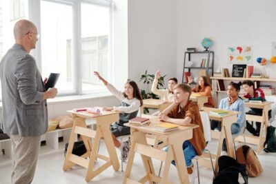 Teacher and students during classroom tutoring